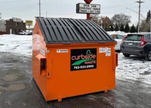 Curbside Waste dumpster rental in parking lot